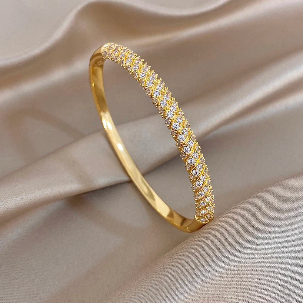 Elegant Geometric Winding Hollow Copper Bangle for Women Shiny Gold Plated Waterproof Spring Bracelet Lady Jewelry Gift